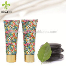 tubo ovalado de flores para el embalaje de cuidado de la piel